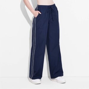 Women’s Mid Rise Wide Leg Track Pants. Color Navy /White